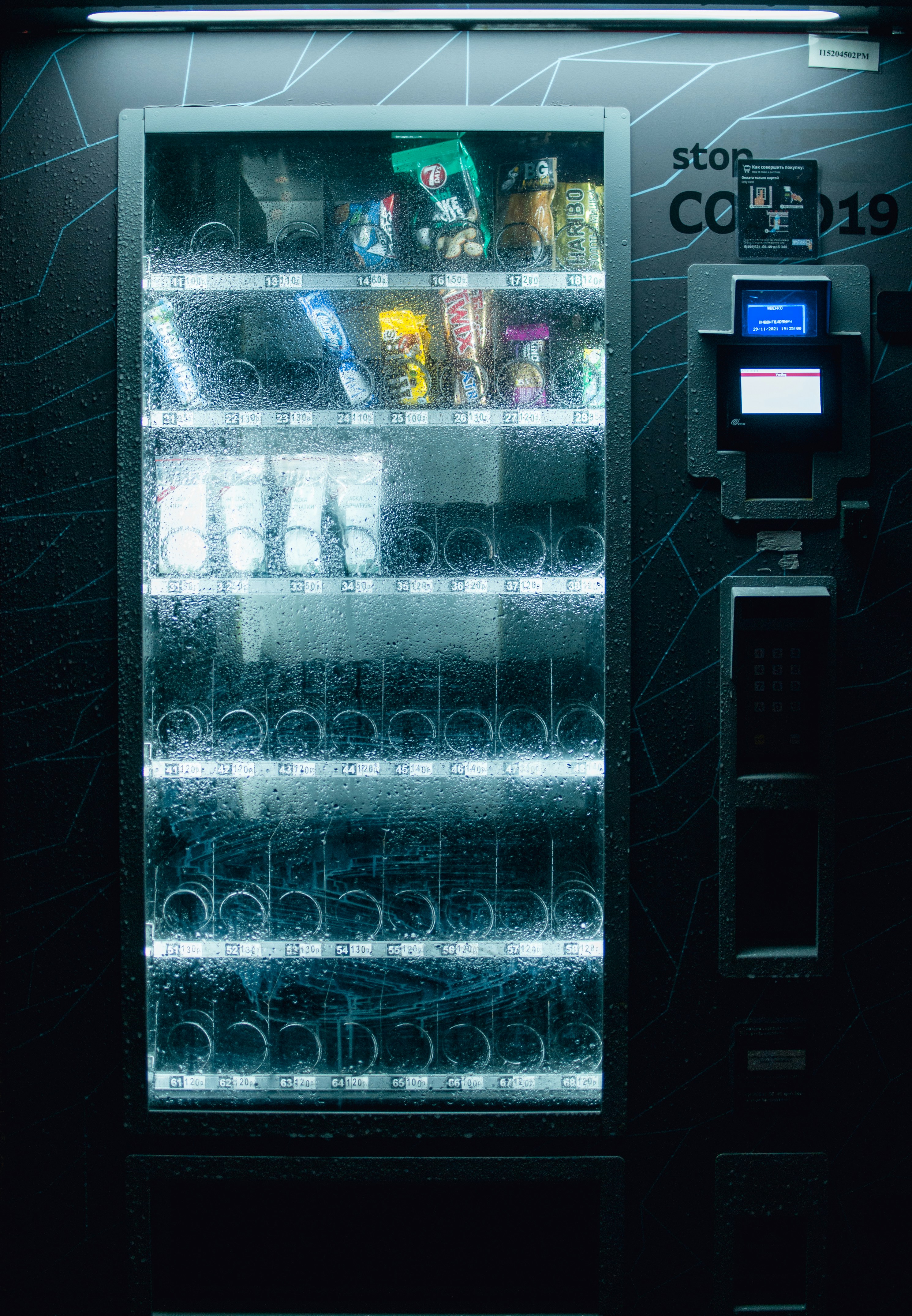 a vending machine with drinks and snacks in it
