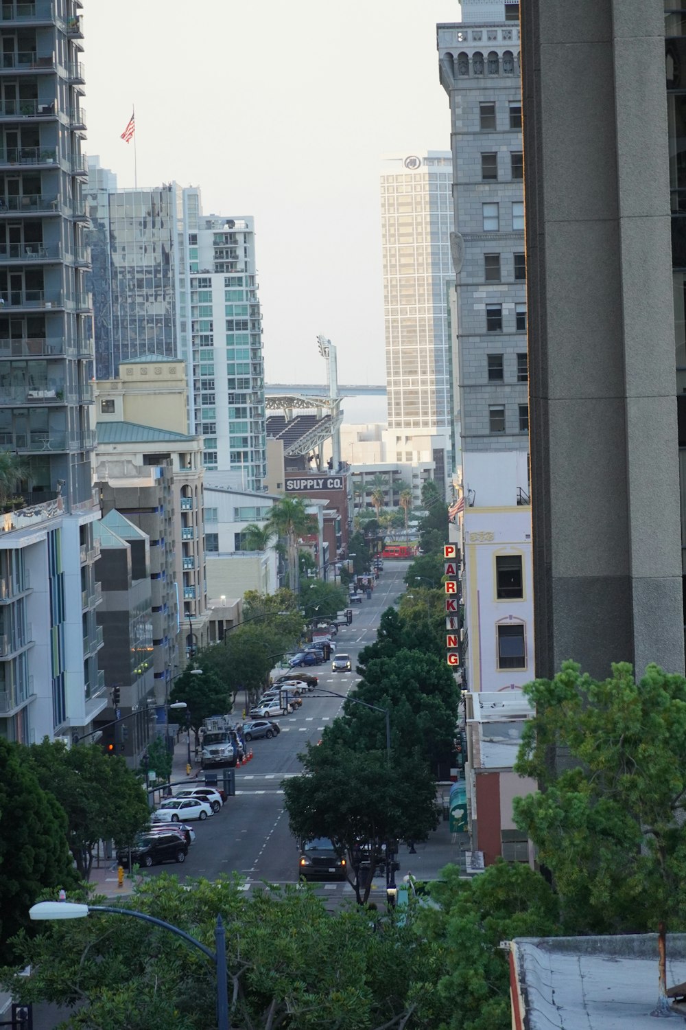 a city street filled with lots of tall buildings