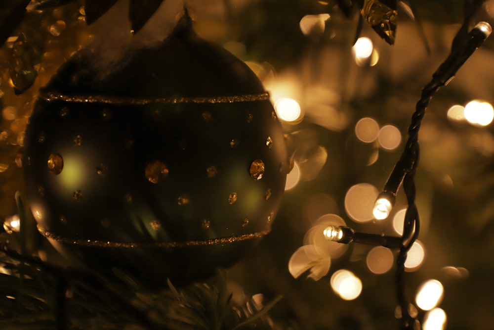 a close up of a christmas ornament on a tree