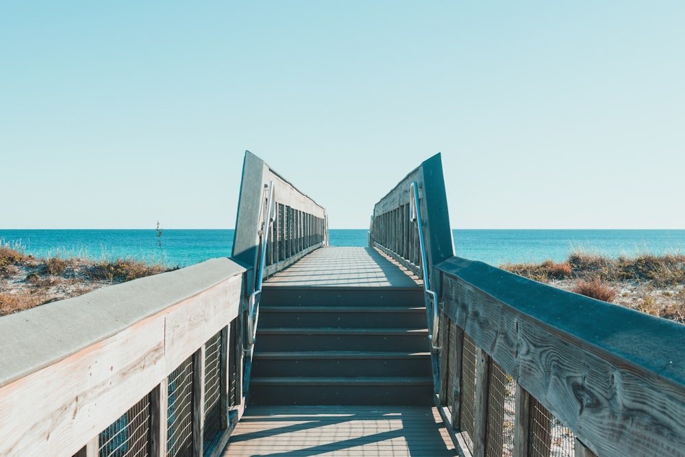 a set of stairs leading to the beach