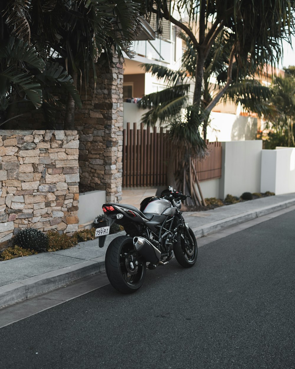 a motorcycle parked on the side of the road