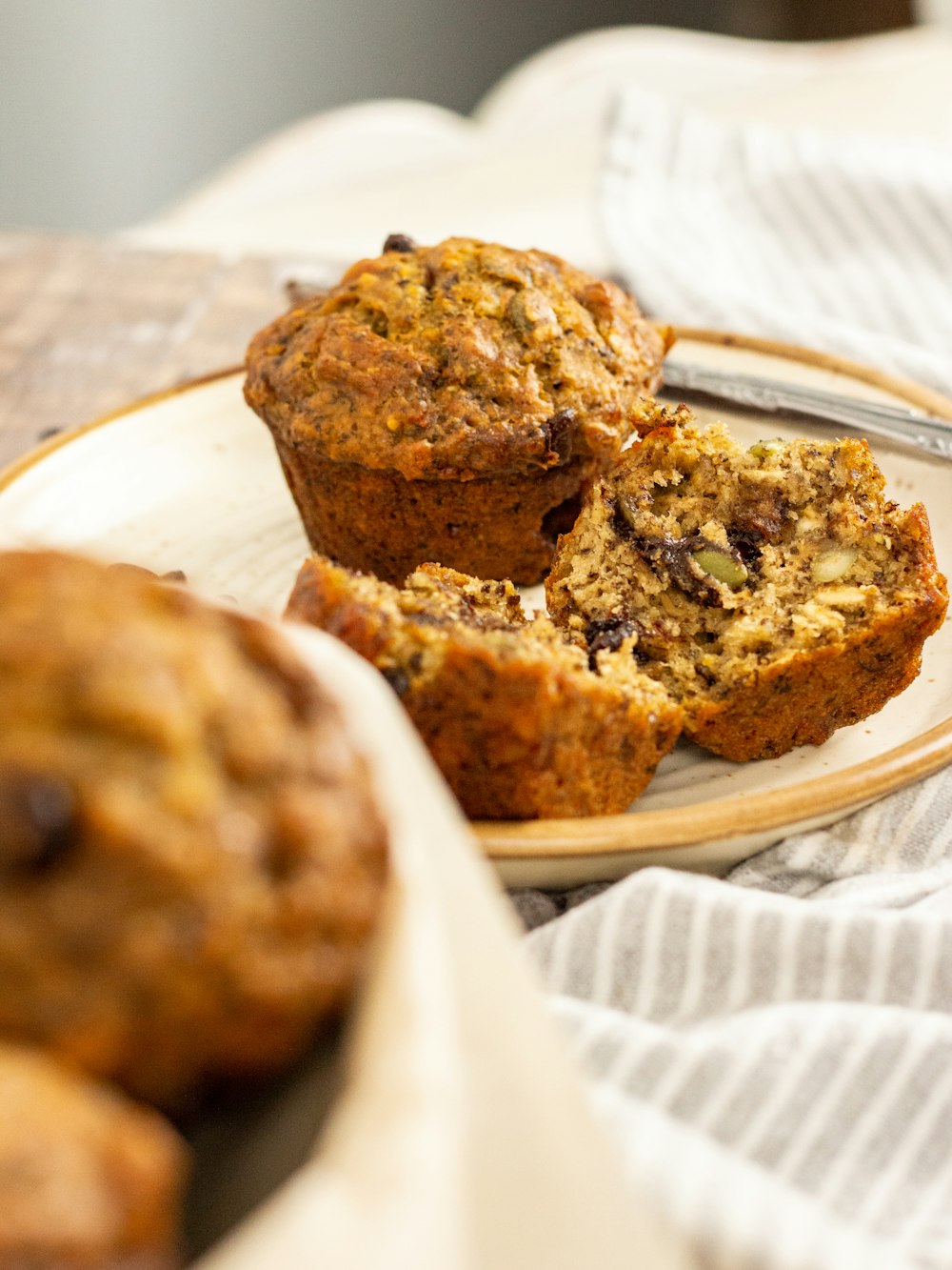 a plate with some muffins on it