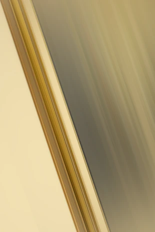 Abstract dark texture with subtle gold accents symbolizing trust and professionalism.