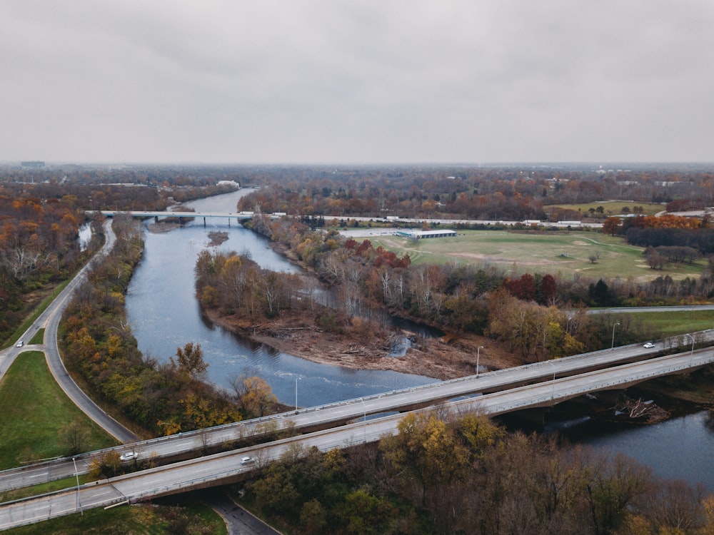 an aerial view of a bridge over a river