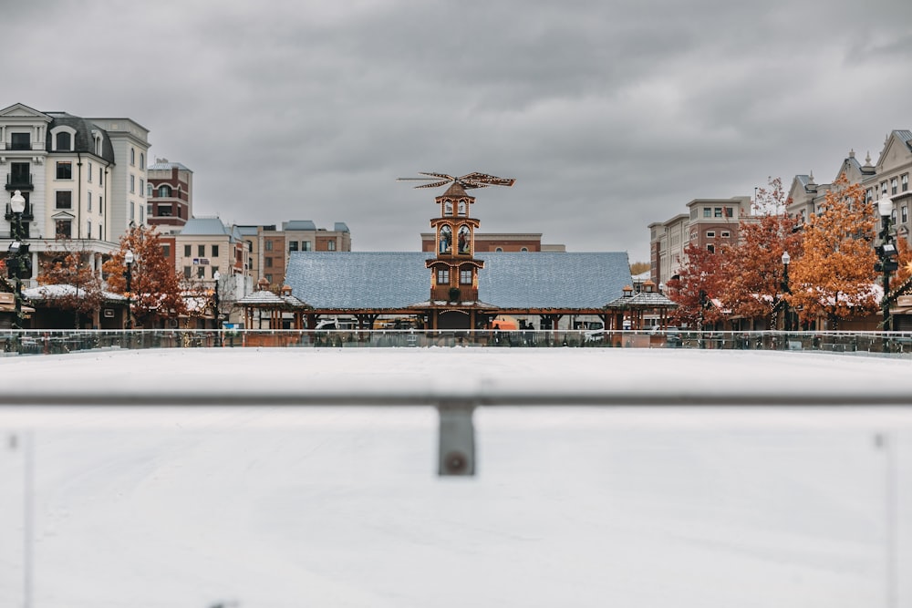 a view of a skating rink in the middle of a city