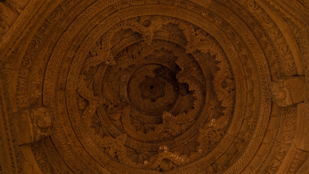 an intricately designed ceiling in a building