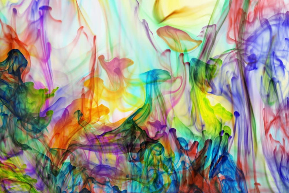 an abstract painting of multicolored ink