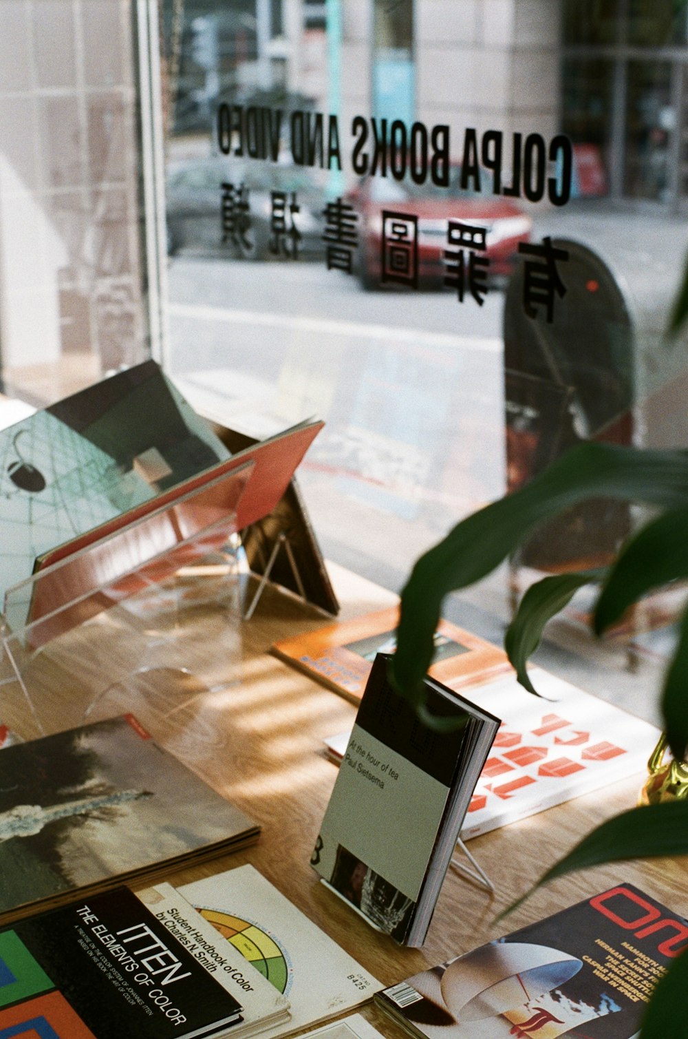 a stack of flyers on a table