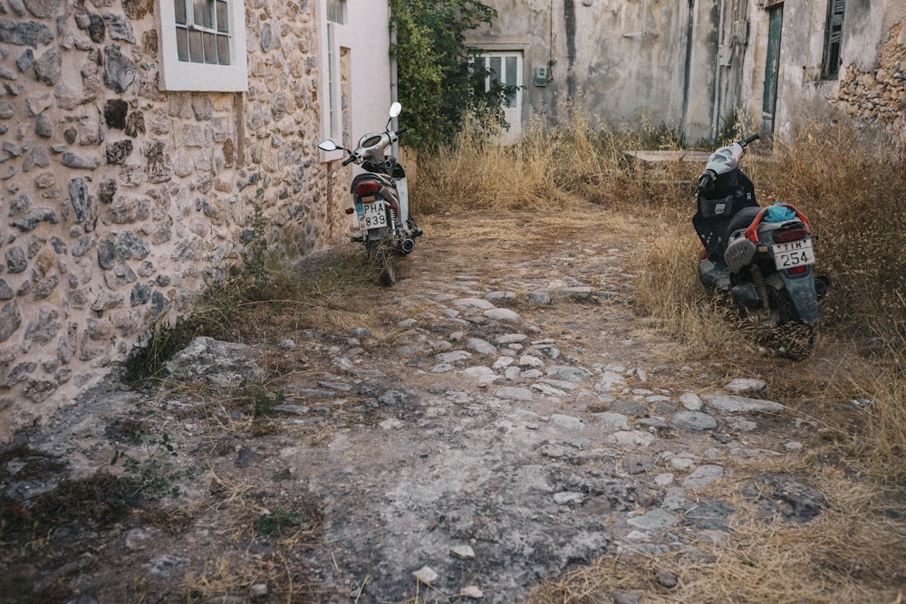 a motorcycle parked on a dirt path