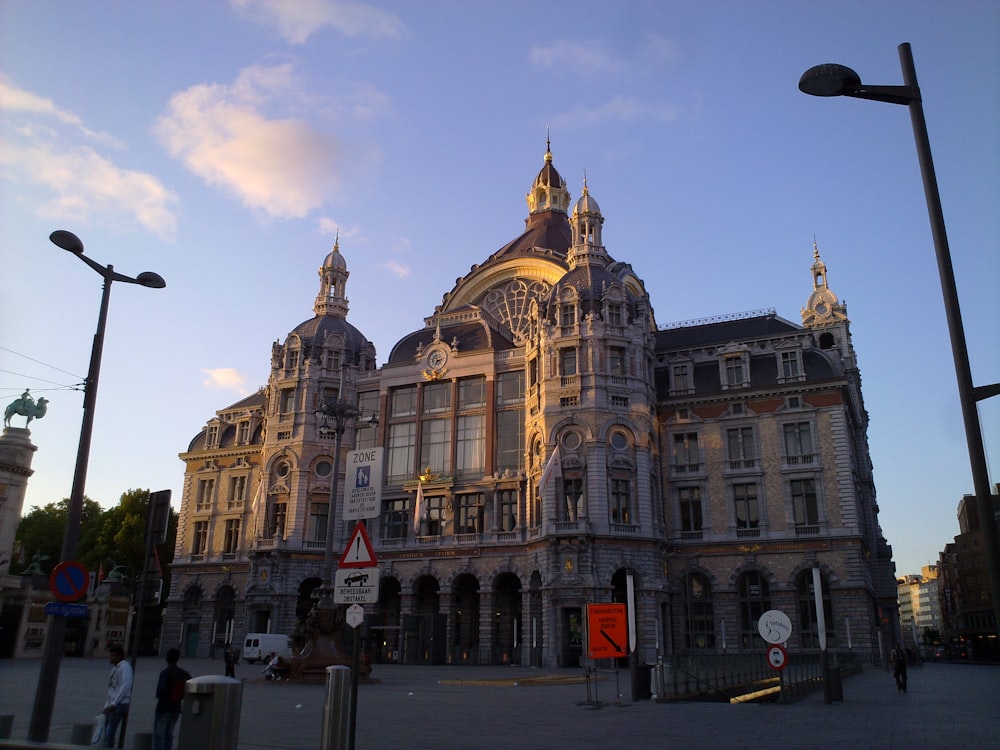 a large building with a clock on the top of it