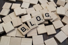 a pile of wooden blocks with the word blog spelled on them