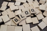 a pile of wooden blocks with the word blog spelled on them