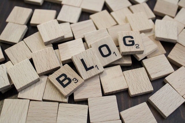 a pile of wooden blocks with the word blog spelled on them
