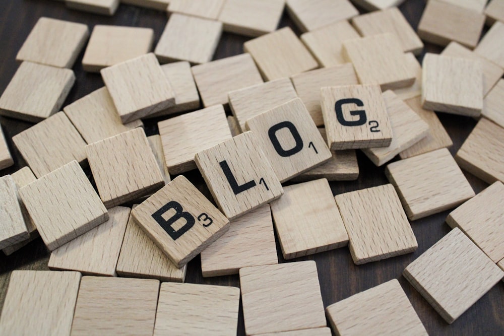 a pile of wooden blocks with the word blog spelled on them