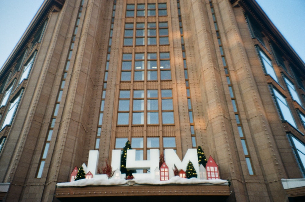 a large building with a sign that says h m on it