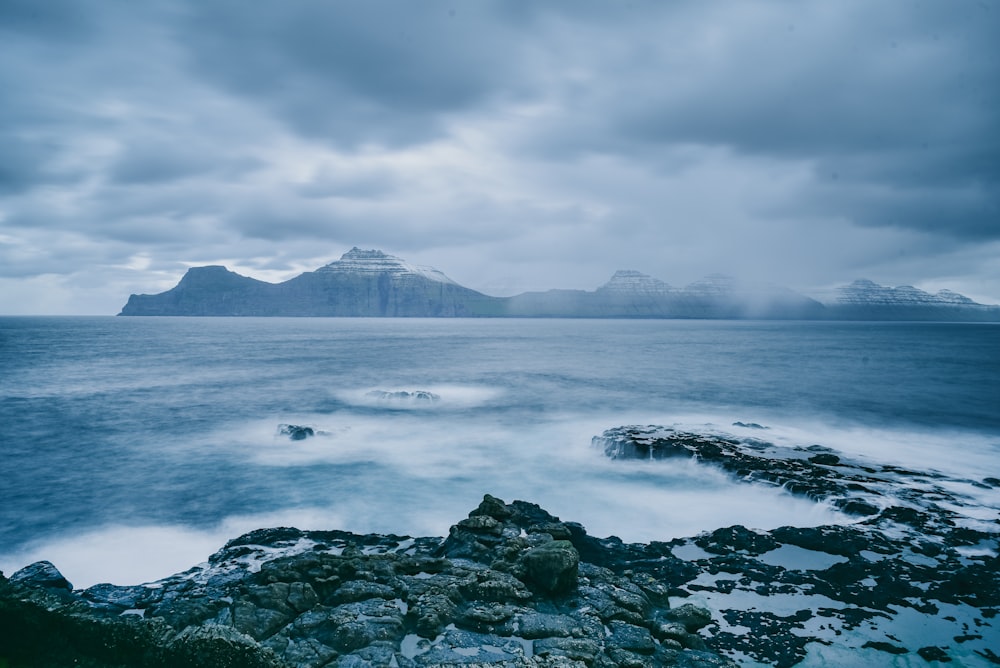 a large body of water surrounded by mountains