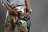a man is holding a video game controller