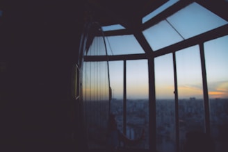 An atmospheric frame from a hotel highlight reel showing elegant interiors at dusk.