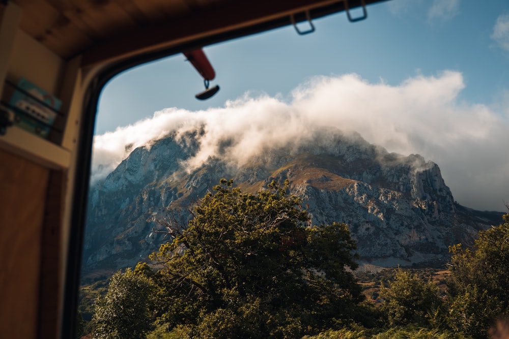 a view of a mountain through a window