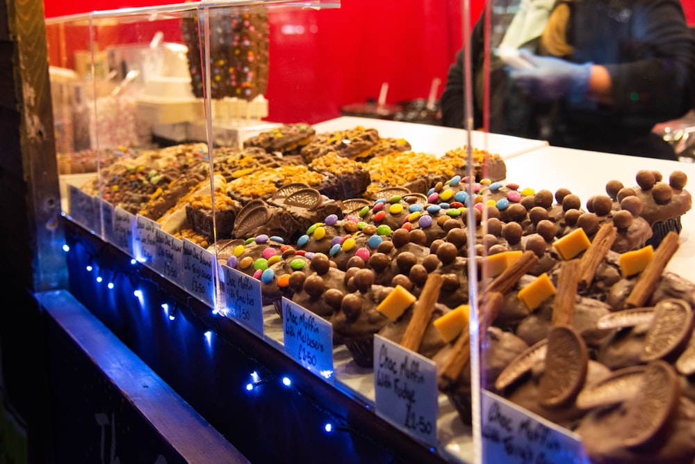 a display case filled with lots of different types of food