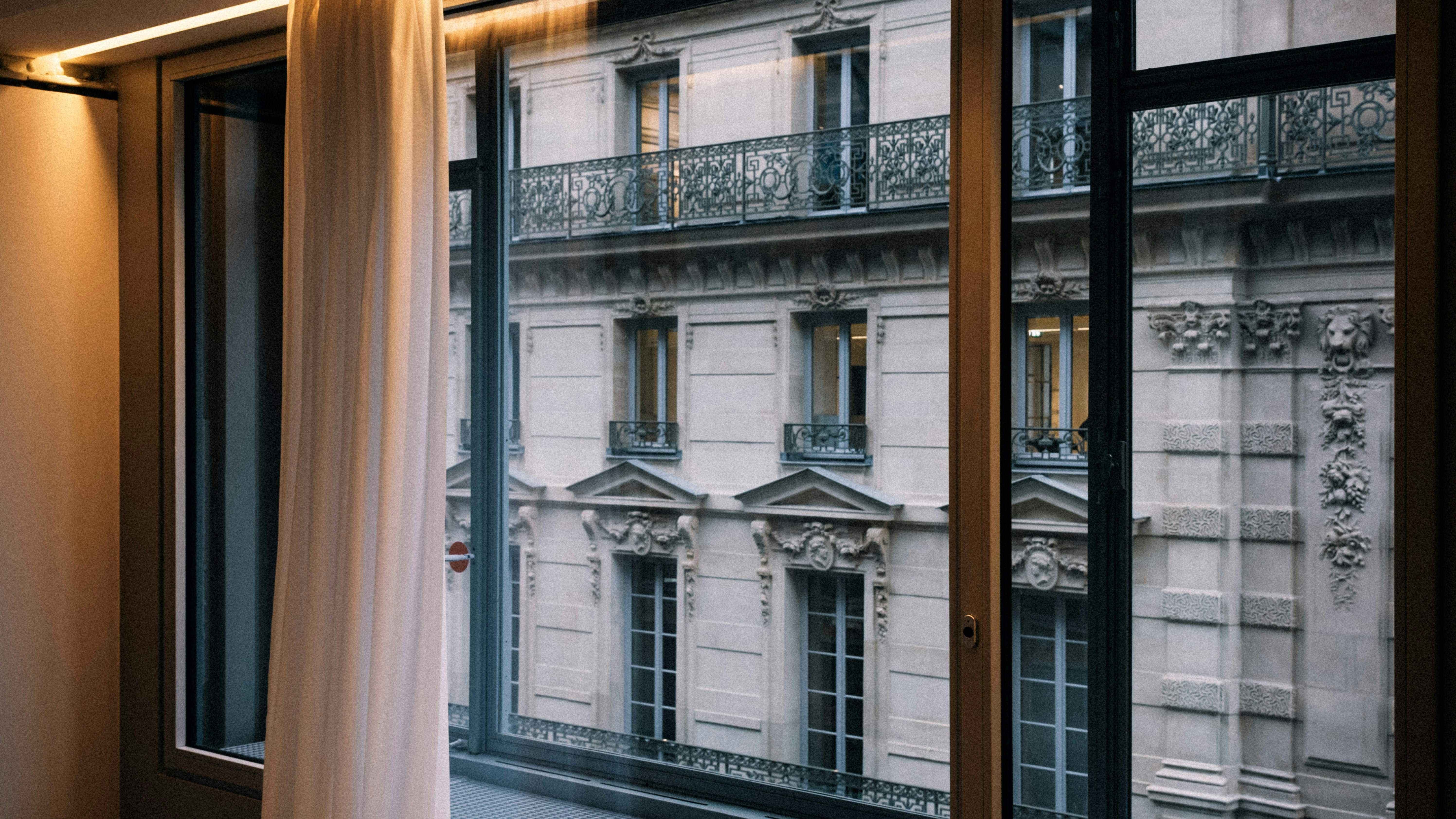 a view of a building through a window, 