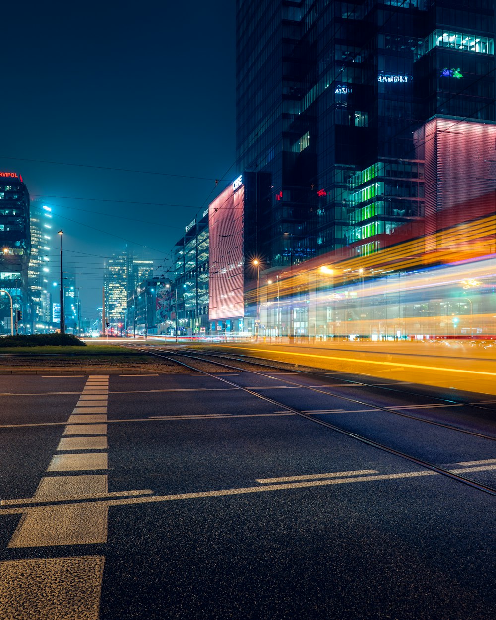 a blurry photo of a city street at night