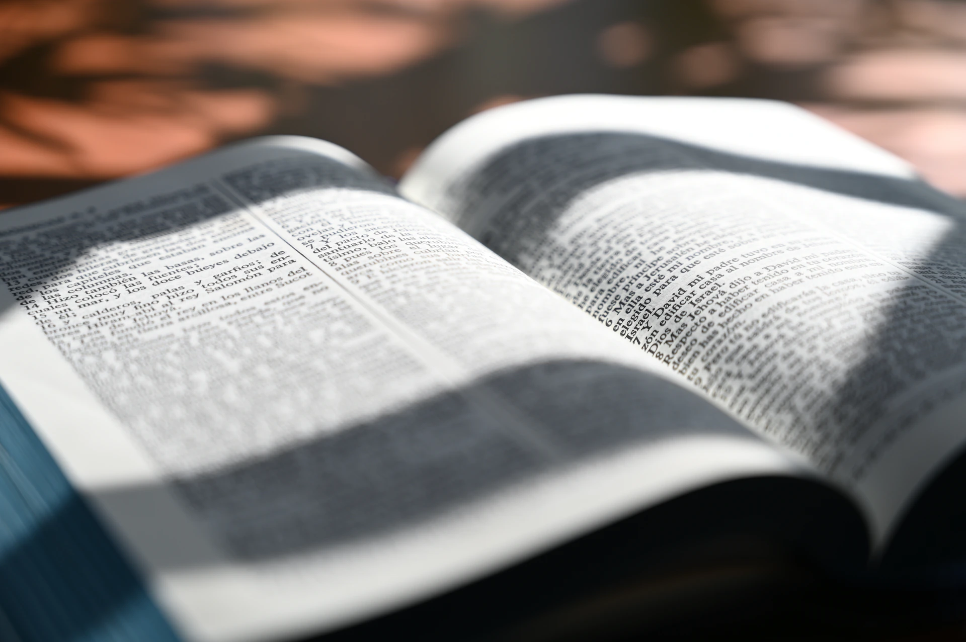 an open book sitting on top of a table