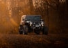 black Jeep Wrangler on dirt road