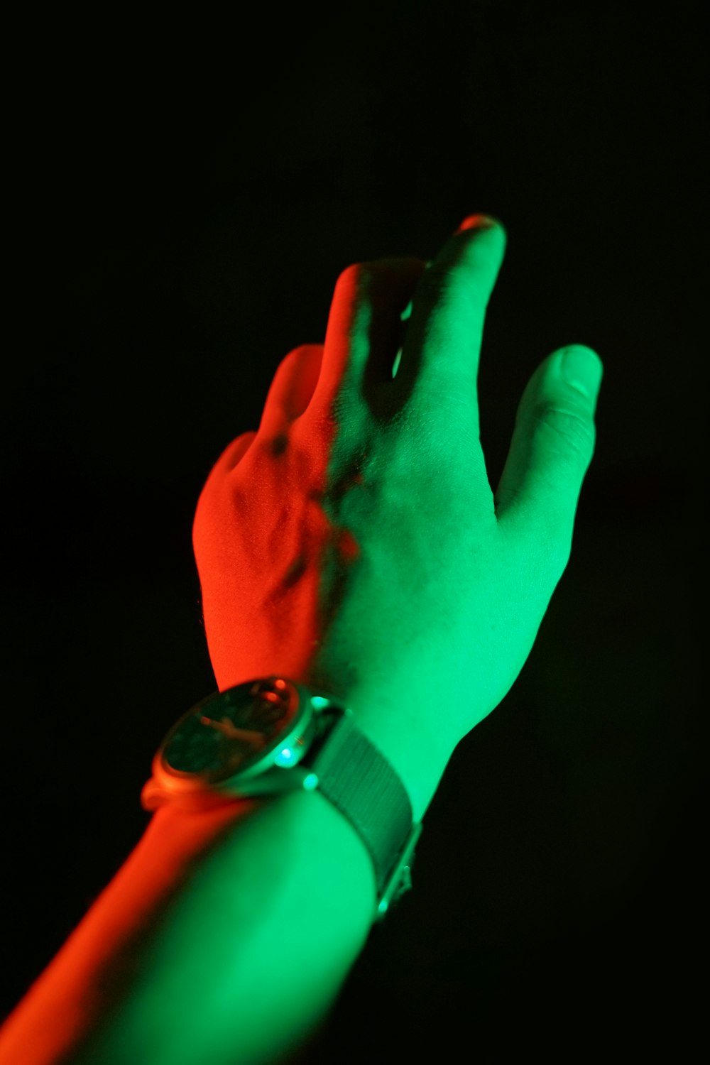 a person's hand with a watch on it