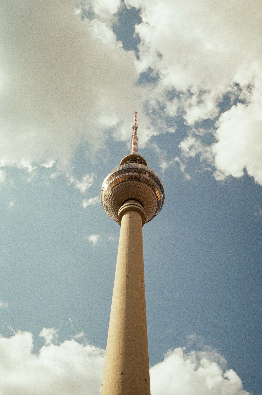 a tall tower with a sky background