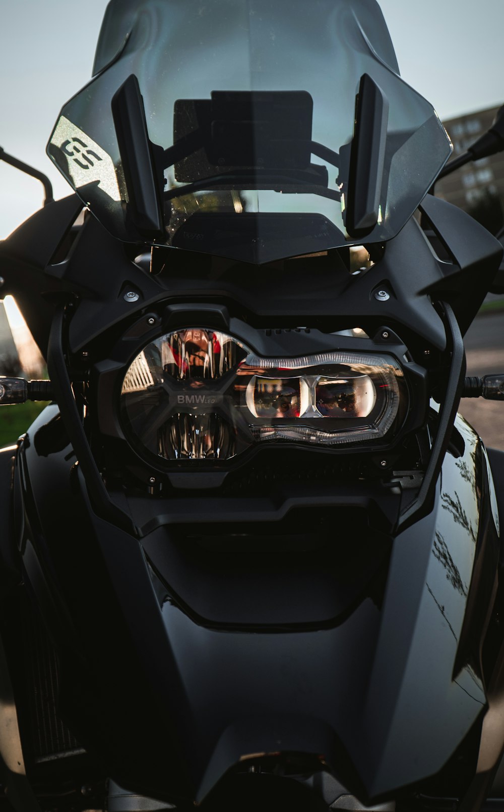 a close up of the headlight of a motorcycle