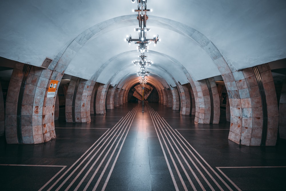 a long tunnel with a light at the end