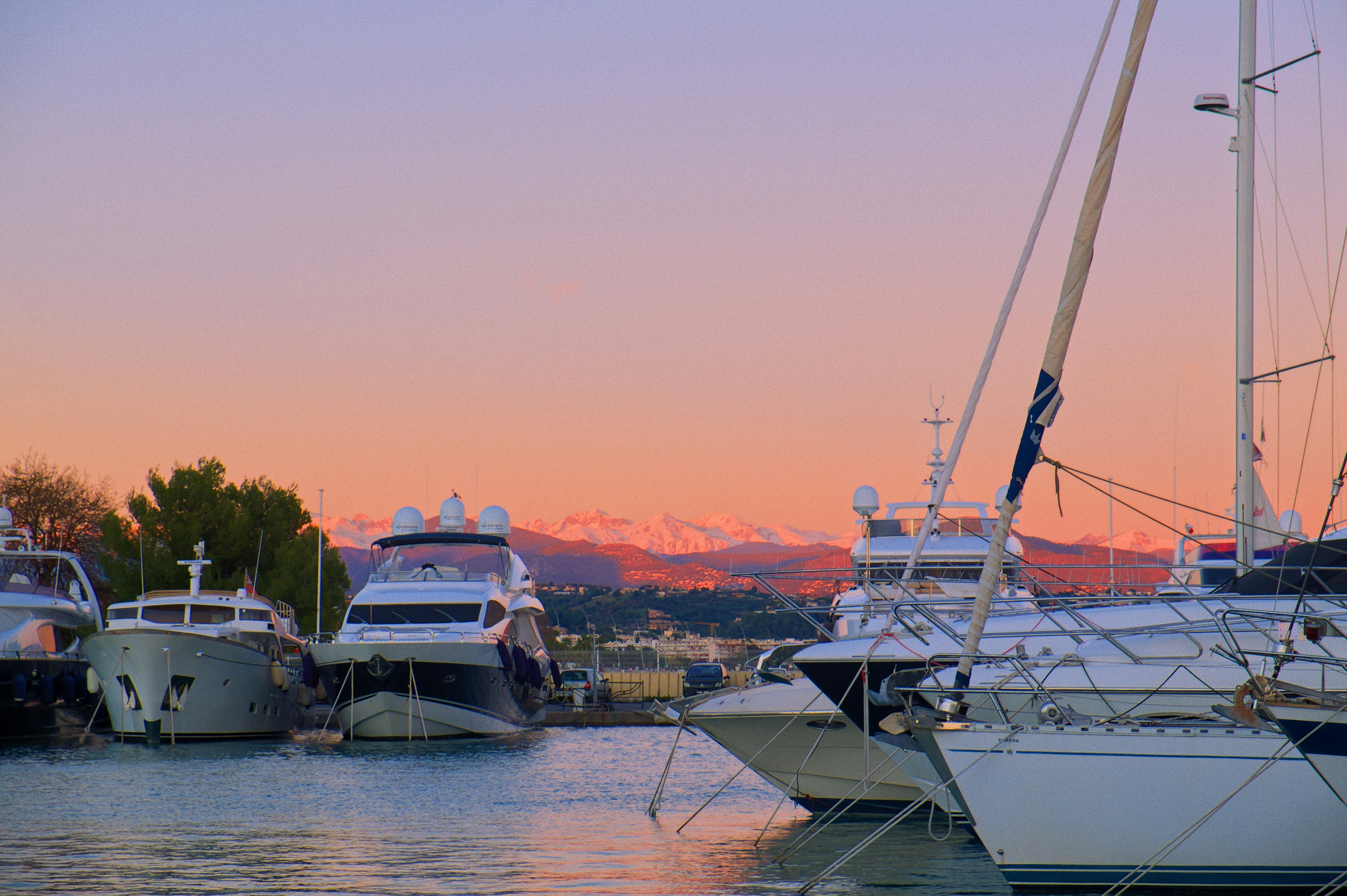 a group of boats that are sitting in the water