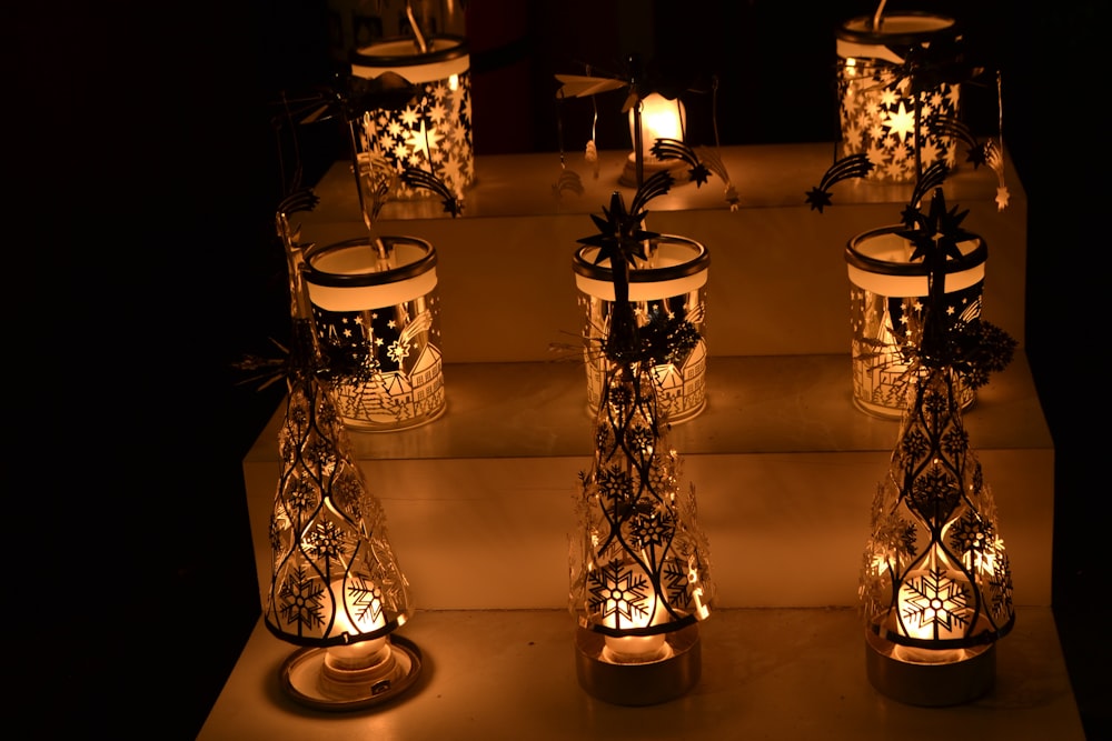 a group of candles sitting on top of a table