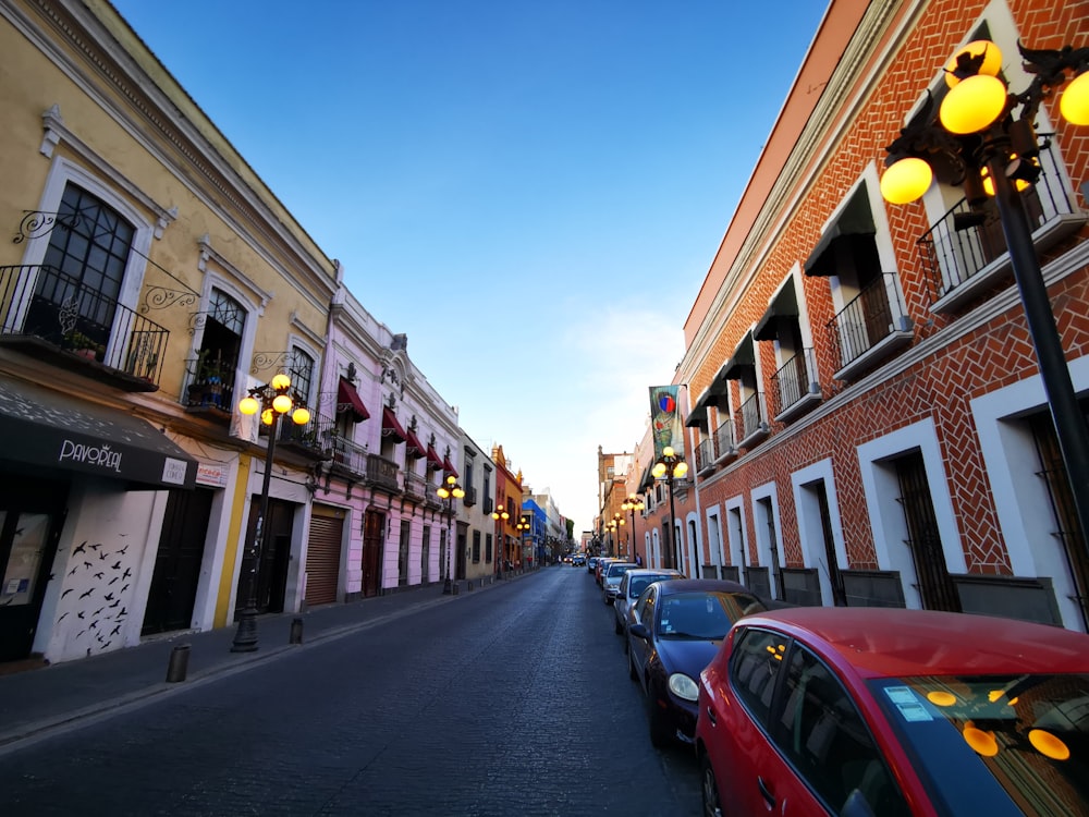 a row of parked cars on a city street