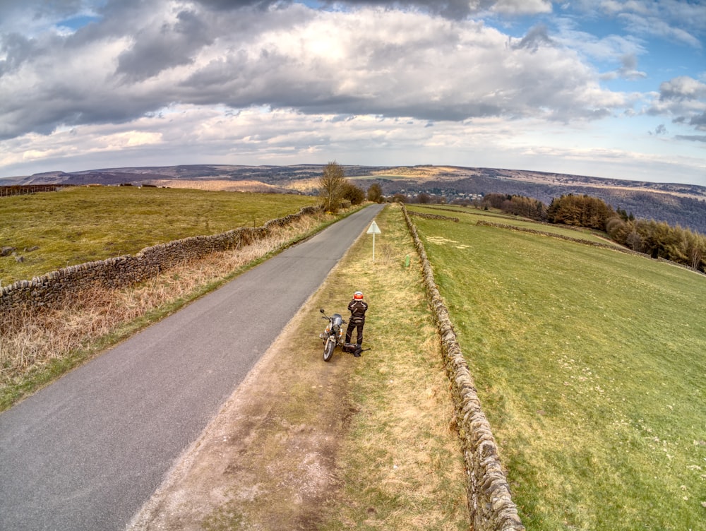 a motorcycle parked on the side of a road