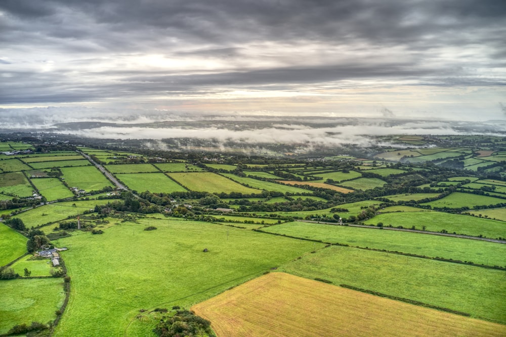 an aerial view of a lush green countryside