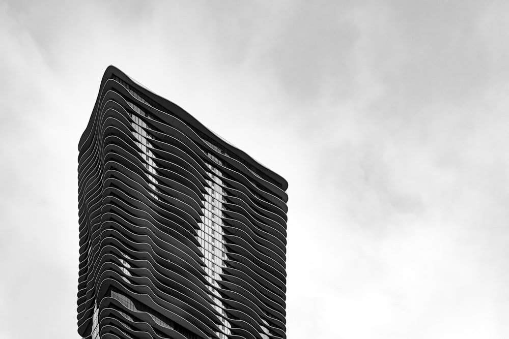 a black and white photo of a tall building