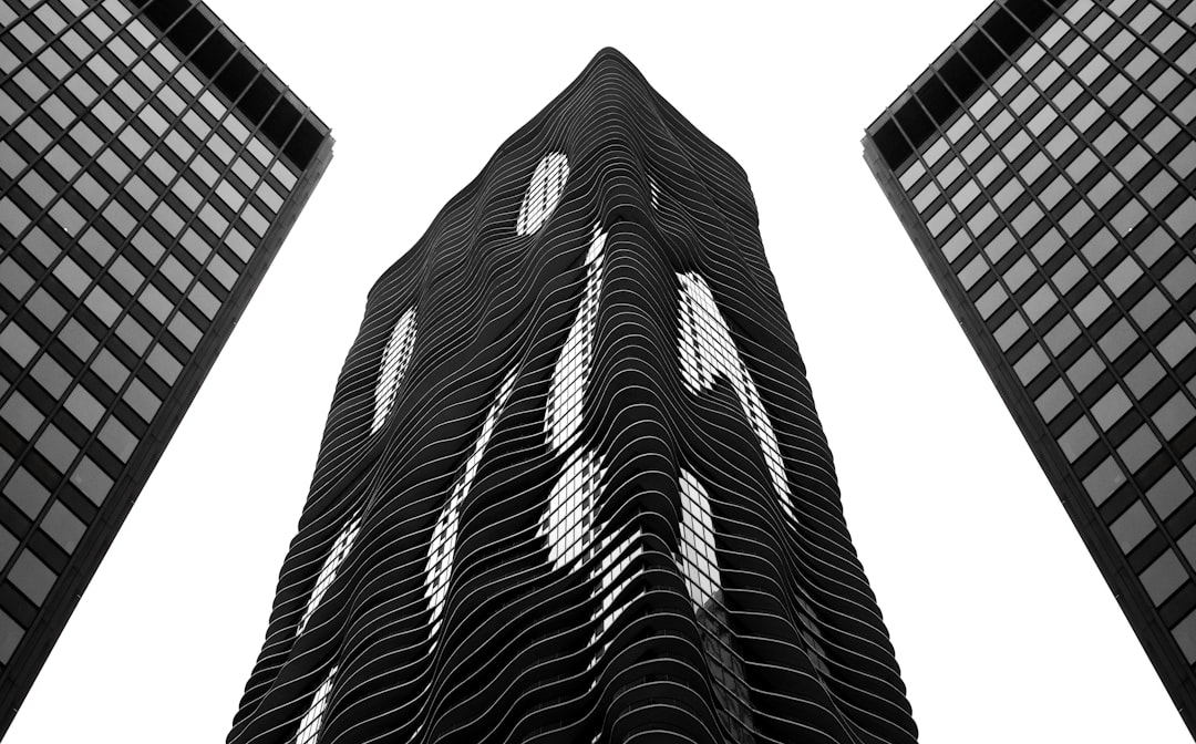 a very tall building towering up into the sky,