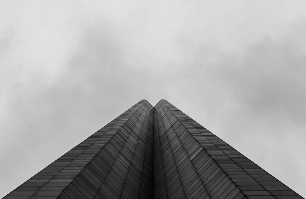 a black and white photo of a tall building