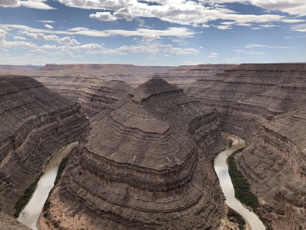 a view of a canyon with a river running through it