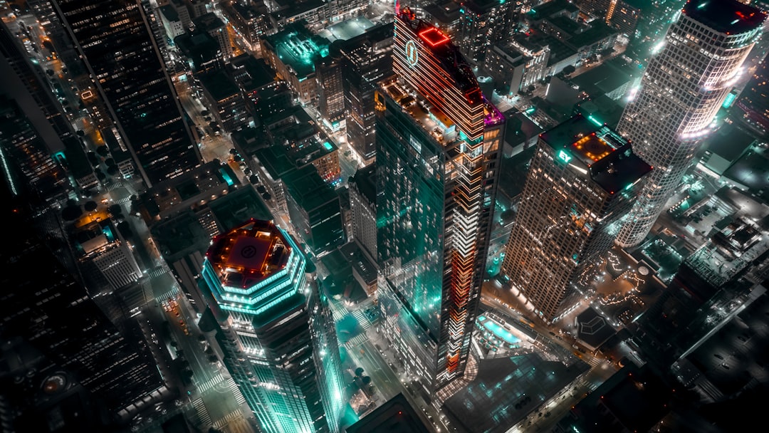 an aerial view of a city at night,