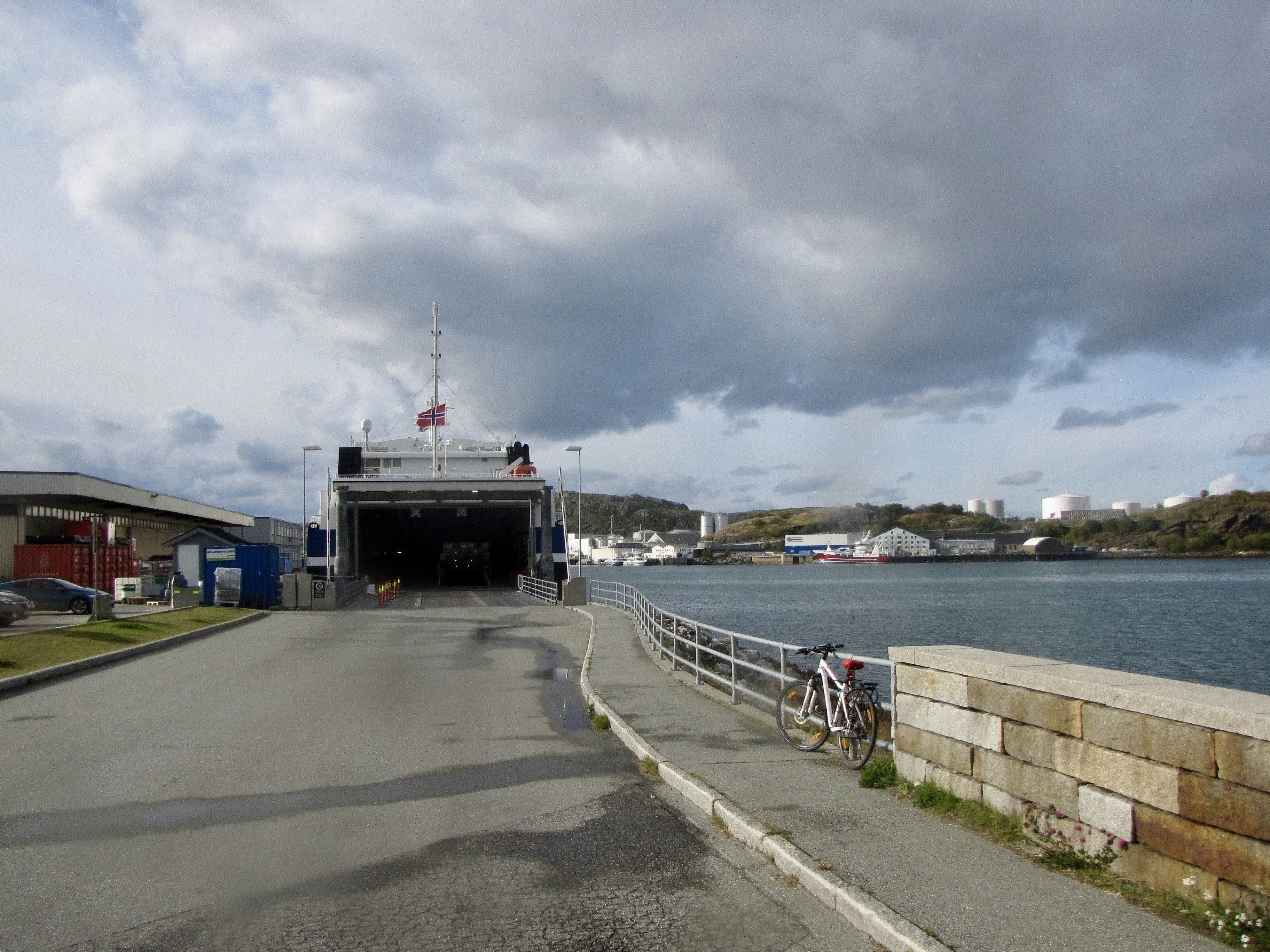 a boat is coming out of a dock
