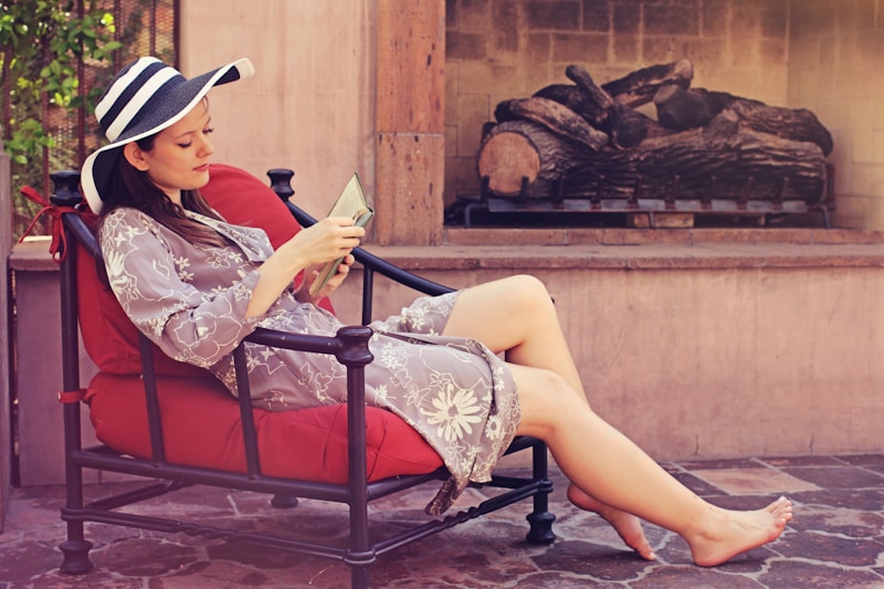 Elegant woman reading in chair