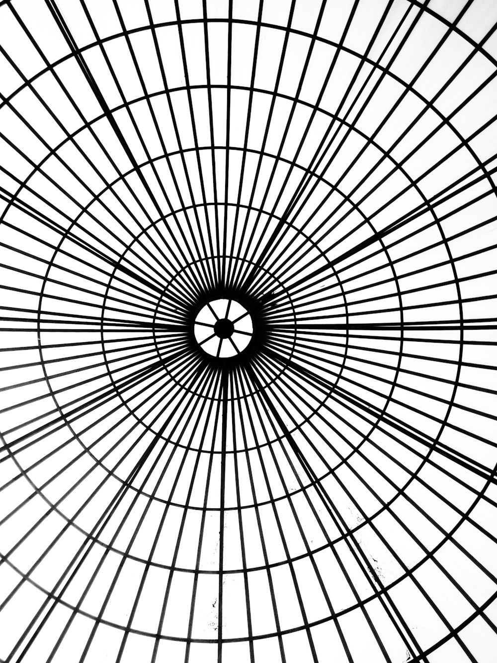 a black and white photo of a ceiling