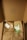 A satisfied customer unboxing a BrightPath Global package.