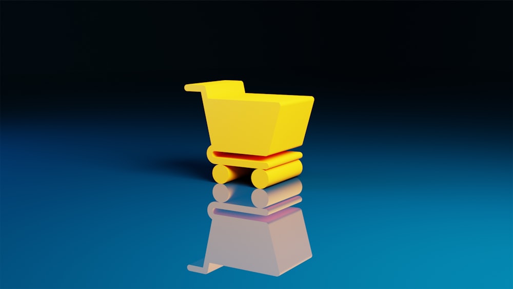 a yellow chair sitting on top of a blue floor