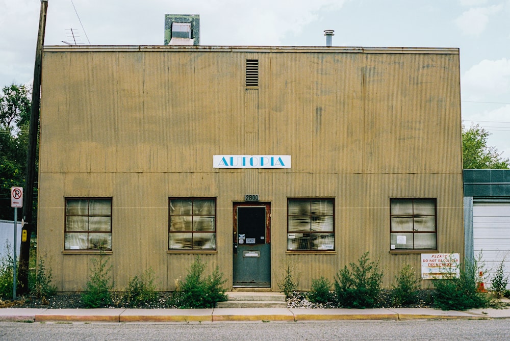 an old building with a sign that says aurora on it