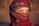 a woman wearing a red headscarf and a red scarf