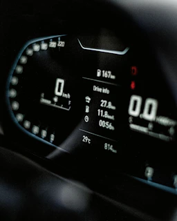 a close up of a speedometer in a car